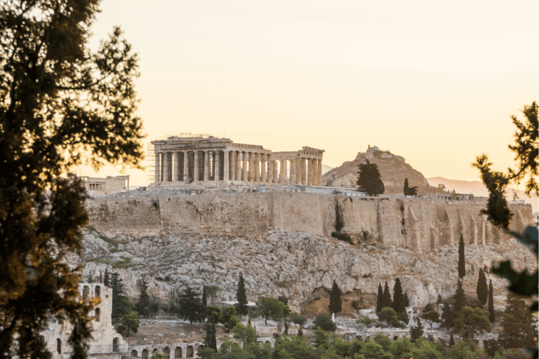 The Acropolis and Parthenon at sunset, a must see stop on an Athens 1 day itinerary.