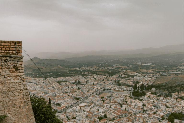 View over Nafplio, Greece, from the Palamidi Fortress on a cloudy day, a popular destination for day trips from Athens.