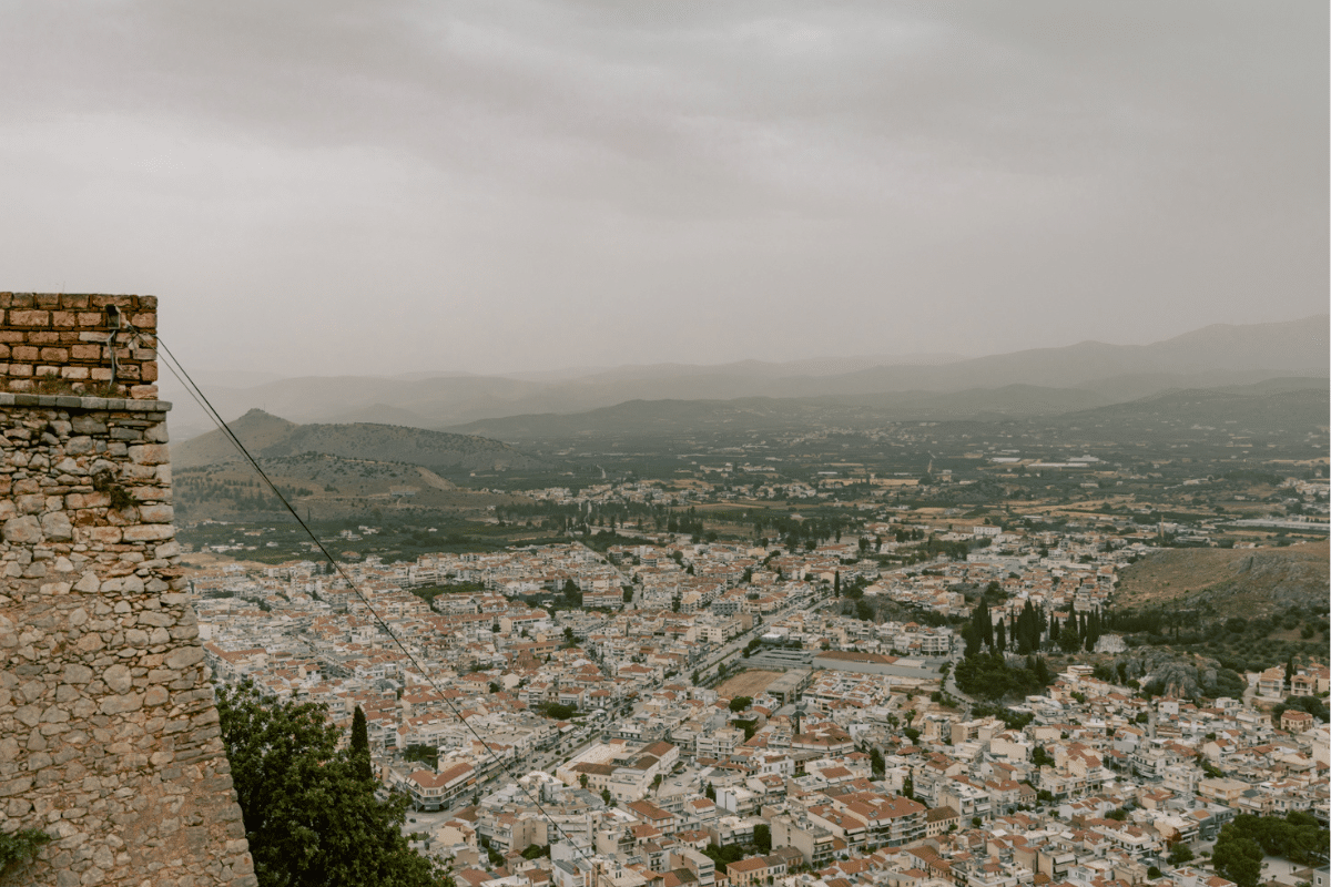 View over Nafplio, Greece, from the Palamidi Fortress on a cloudy day, a popular destination for day trips from Athens.