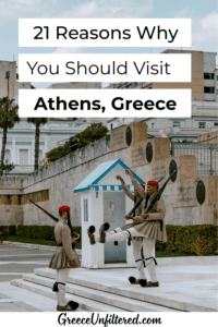 Evzones guards in traditional uniforms perform the ceremonial change in front of the Greek Parliament building in Athens, raising their legs in sync. The historic setting, paired with bold text stating “21 Reasons Why You Should Visit Athens, Greece,” visually supports the post’s focus on answering: is Athens worth visiting.