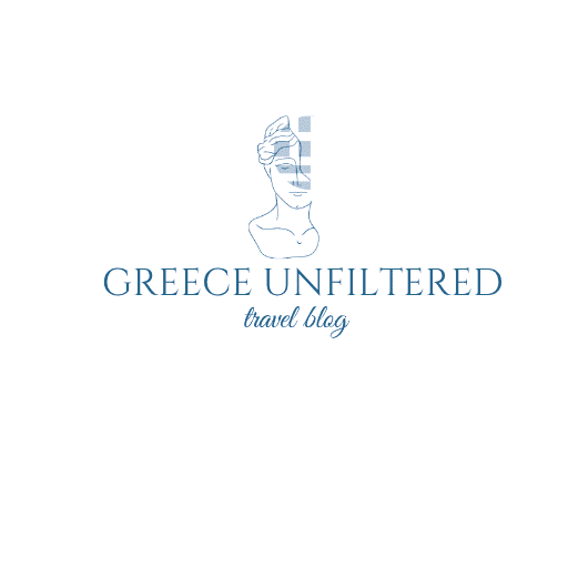 Greece Unfiltered travel blog logo. Outline of a woman Greek statue with the Greek flag over her face. Text reads Greece Unfiltered travel blog.