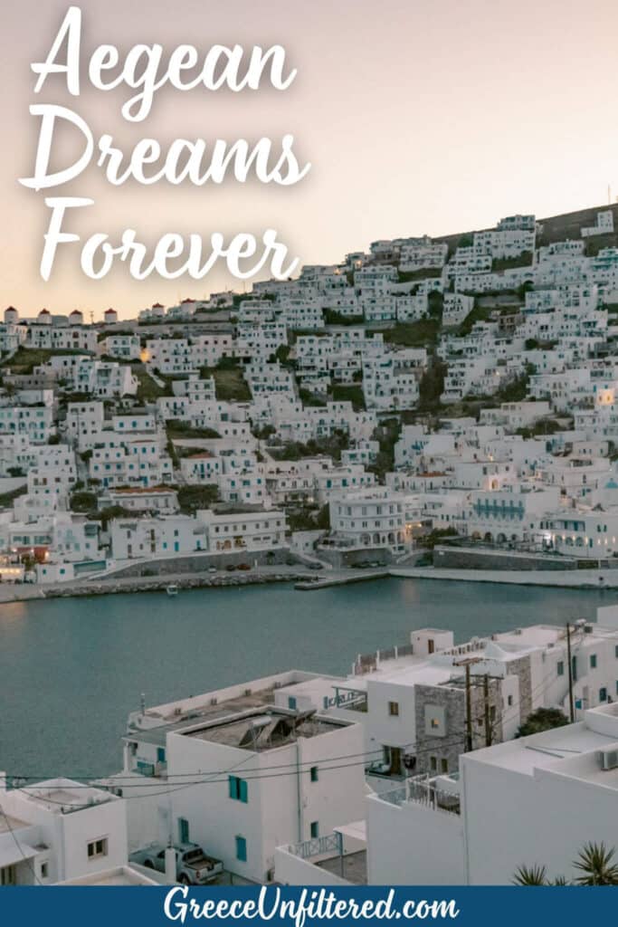 A stunning whitewashed village cascades down a hillside to the water at sunset on a Greek island, with the phrase “Aegean Dreams Forever” overlaid.