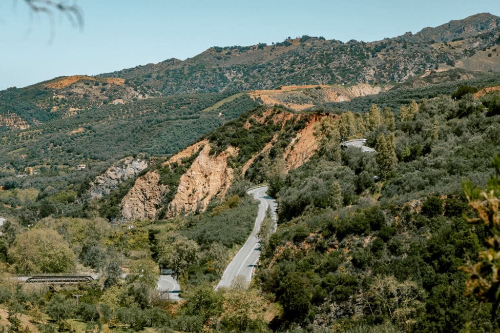 Winding road through the hills near Chania, showing the scenic mountain drives and countryside day trips in western Crete