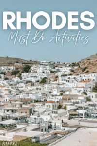 Pinterest graphic for Rhodes must do activities, showing the whitewashed village of Lindos in Rhodes with large title text.