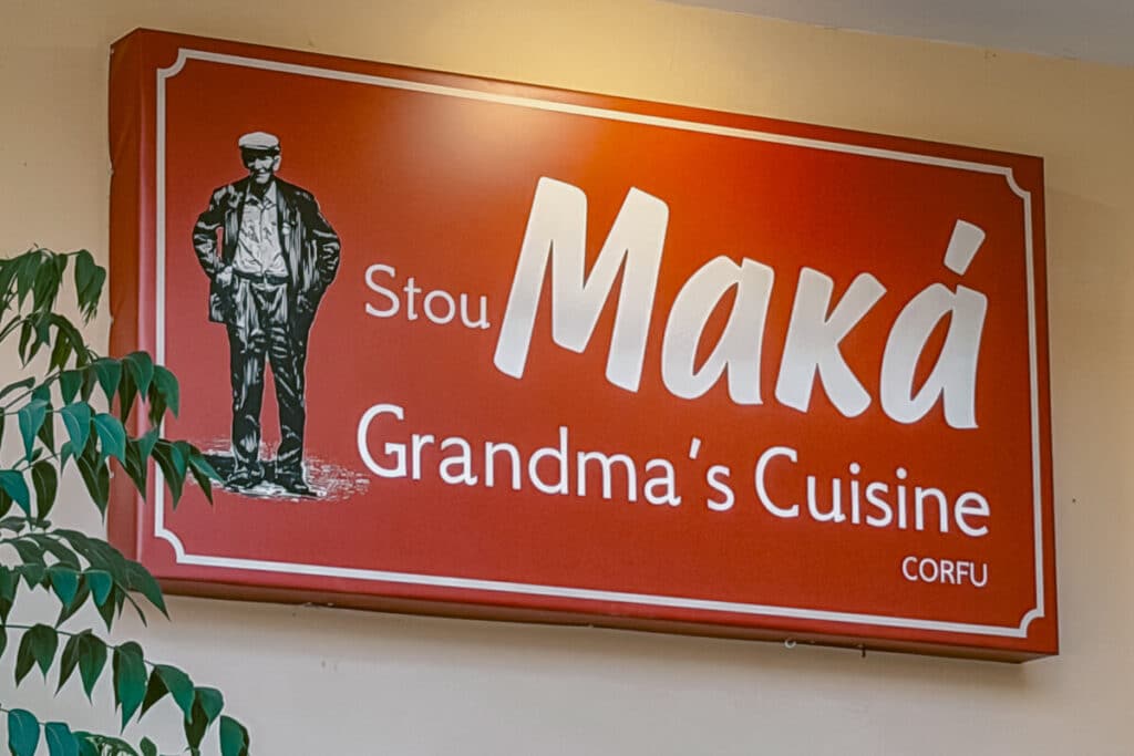 Red Stou Maka Grandma’s Cuisine sign inside a Corfiot restaurant in Corfu Town.
