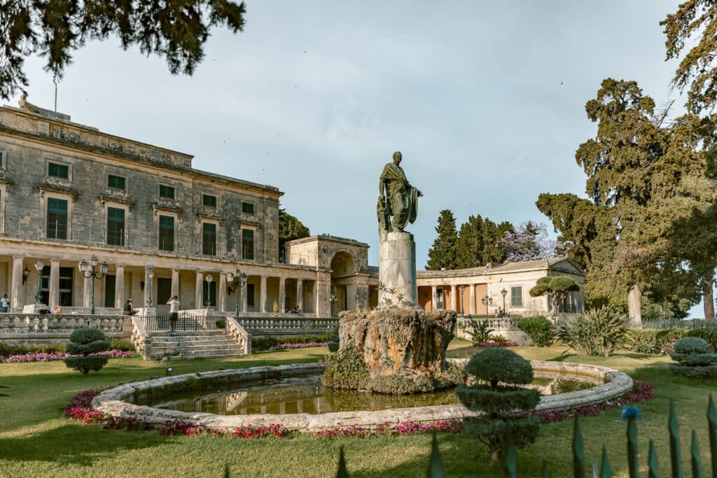 Garden and statue near Anaktoron Square and the Palace of St. Michael and St. George in Corfu Old Town.